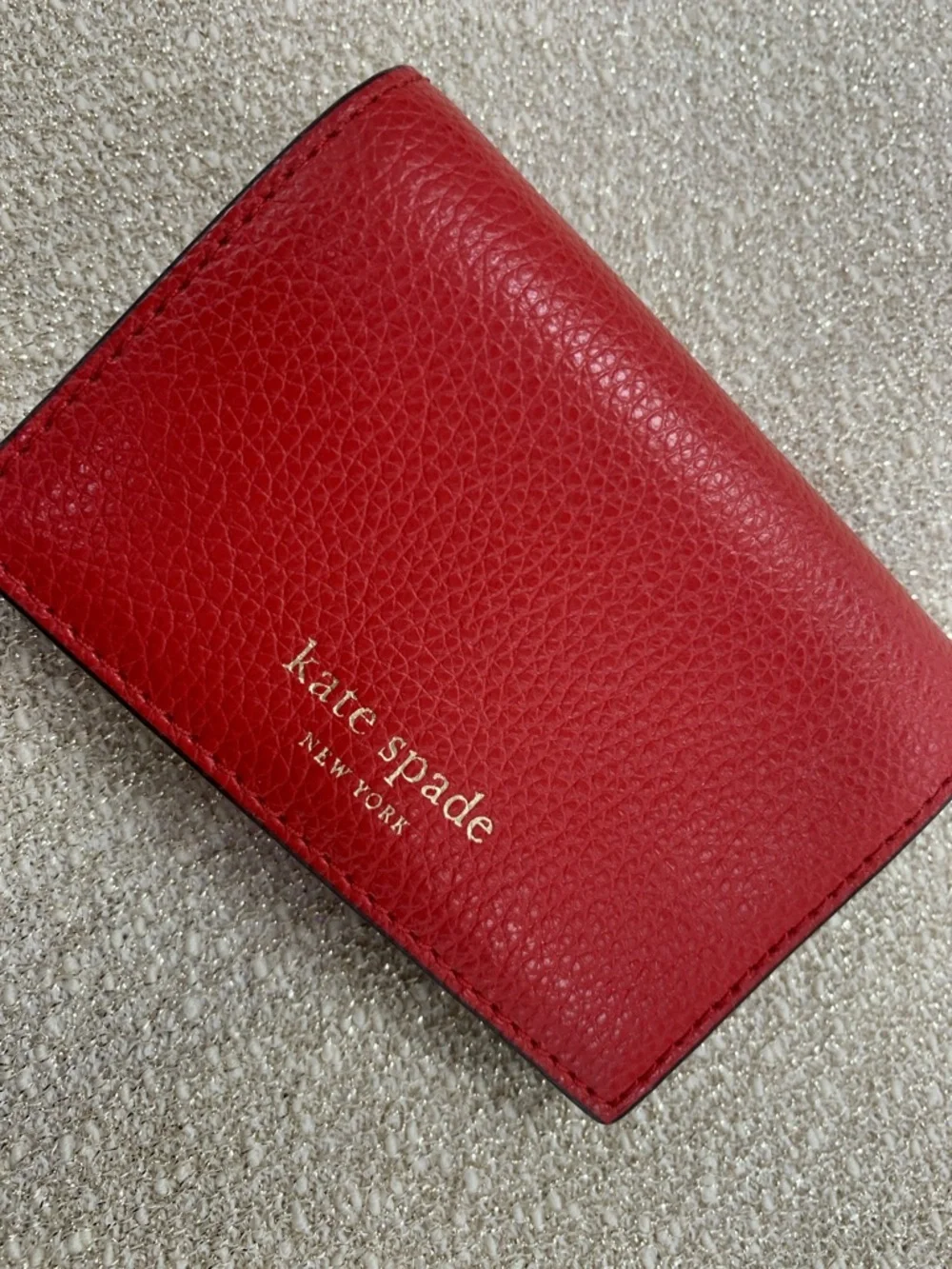kate spade Red Pebbled Leather Wallet with Gold Logo